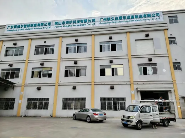 Edificio de la fábrica en Daliang (Shunde), con el rótulo de Foshan Honghu Technology en la fachada