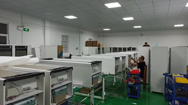 Cabinet bodies on the production floor during wiring and assembly